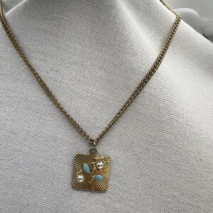 EMJ gold tone enamel and faux pearl flower pendant